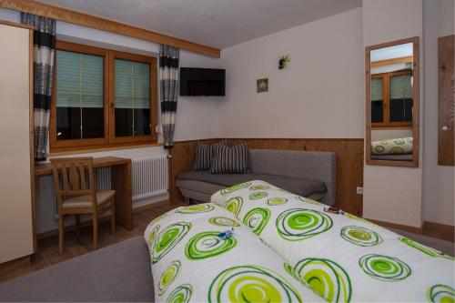 Una cama o camas en una habitación de Appart Julia