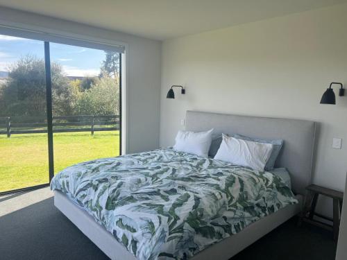 Postel nebo postele na pokoji v ubytování Cosy Kinloch