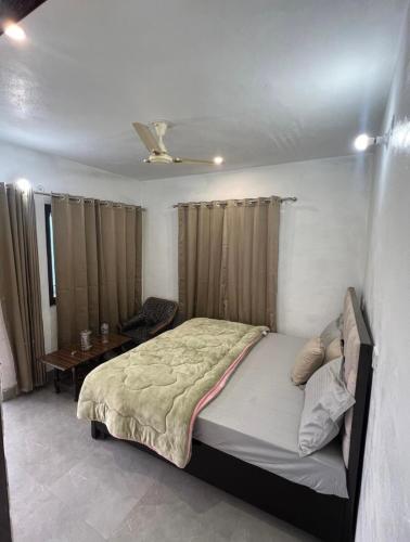 Cama o camas de una habitación en mayur homestay
