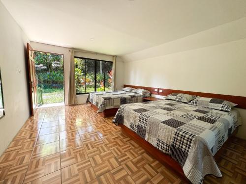 Postel nebo postele na pokoji v ubytování Oro Verde Lodge