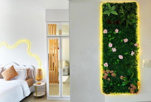 Ένα ή περισσότερα κρεβάτια σε δωμάτιο στο Panoramic Condo 50 sqm Karon