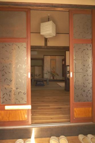 an entrance to at Aioi Yanto 一日一組限定古民家宿 in Otaru