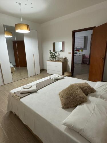Ένα ή περισσότερα κρεβάτια σε δωμάτιο στο Casa Sole Sofiè