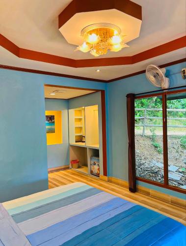 a room with a large rug on the floor at Mom Boutique Railay in Railay Beach