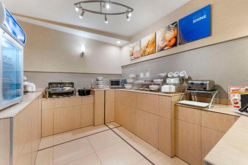 a fast food restaurant with a counter with food at Comfort Suites Monaca in Monaca