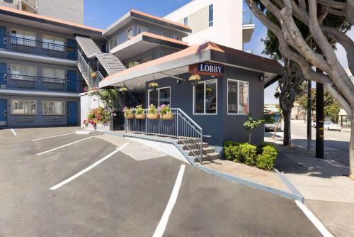 a parking lot in front of a building at Travelodge by Wyndham by Fisherman's Wharf in San Francisco
