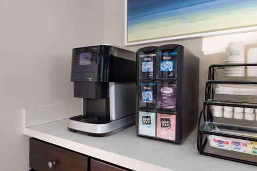 a coffee machine sitting on top of a counter at Travelodge by Wyndham by Fisherman's Wharf in San Francisco