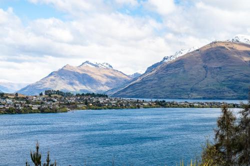 a view of a lake with mountains in the background at Spectacular views uninterrupted! 3 BR, Private! in Queenstown