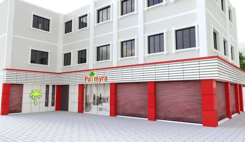 a rendering of a building with a parking garage at Hotel Palmyra Grand Inn in Tirunelveli