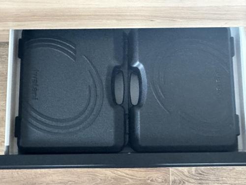 a black iphone in a box on a table at ZABOCON YOICHI Villa in Yoichi