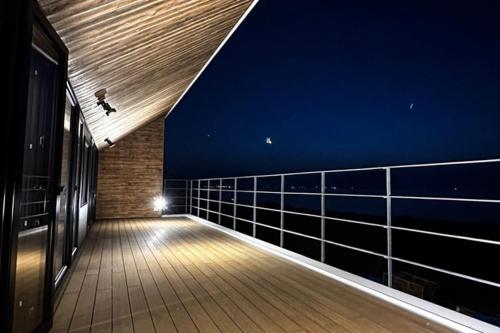 an empty deck of a cruise ship at night at ZABOCON YOICHI Villa in Yoichi