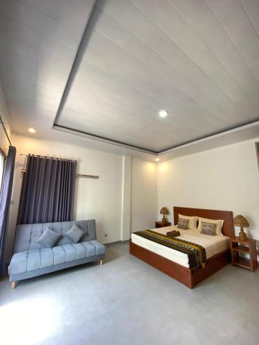 Giường trong phòng chung tại Cewin's Homestay