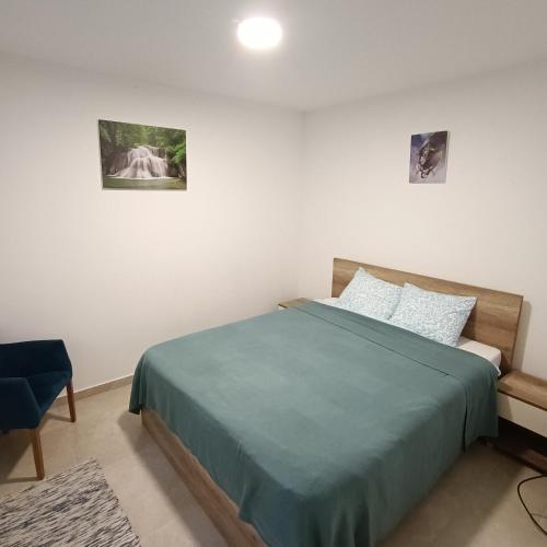 Postel nebo postele na pokoji v ubytování Apartmani Porta Infinitas