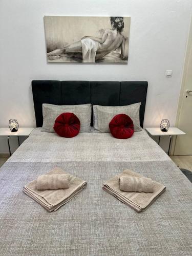 Postel nebo postele na pokoji v ubytování Arkadia`Kalithea