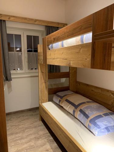 a couple of bunk beds in a room at Ferienhaus Philipp Rofner in Leogang