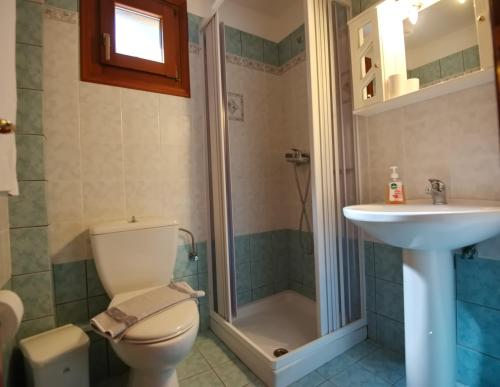 Koupelna v ubytování Kamelia Villas