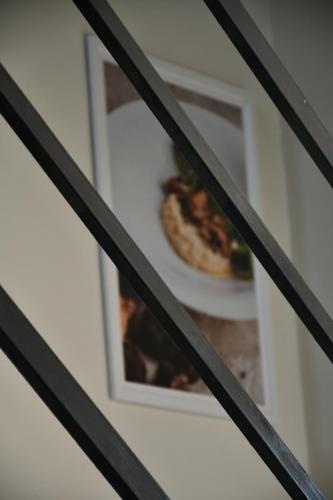 a picture of a pizza in a picture frame at Dimora il Tartufo Relax e Benessere con Spa Privata in Busso