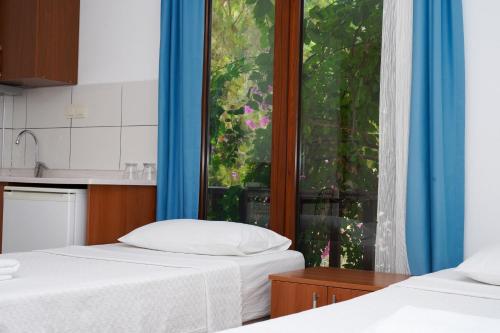 Katil atau katil-katil dalam bilik di Akyaka Nehir Butik Otel