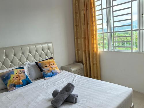 Postel nebo postele na pokoji v ubytování Sweet Homestay Suite 3BD Room Langkawi Kuah Langkawi