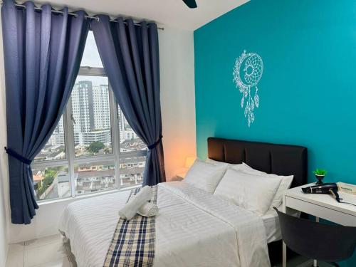Postel nebo postele na pokoji v ubytování Ipoh Midtown Anderson Suite 2R2B