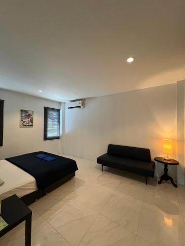 Postel nebo postele na pokoji v ubytování Chics Resort ชิคส์รีสอร์ท