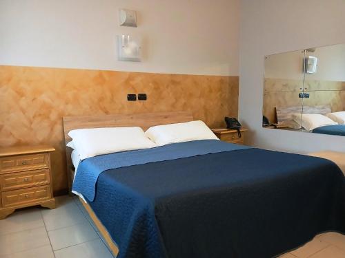 Postel nebo postele na pokoji v ubytování Hotel Motel Est