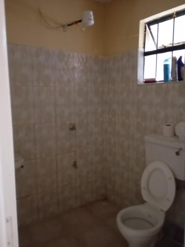 Koupelna v ubytování Attique homes, Kitengela