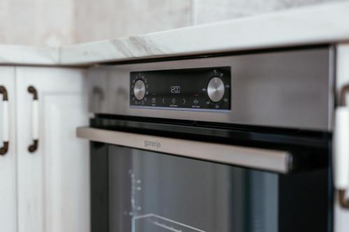 Η κουζίνα ή μικρή κουζίνα στο Penthouse Belgrade