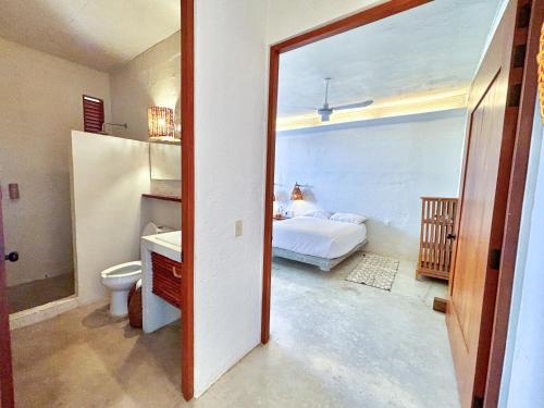 Katil atau katil-katil dalam bilik di Villa Patos -Lagoon Front