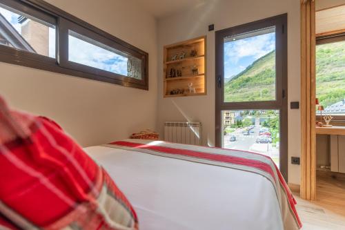 Postel nebo postele na pokoji v ubytování Apartamento Ruda - en Vielha