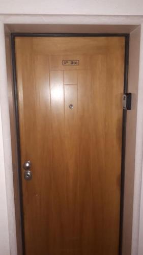 a wooden door with a sign on top of it at Sweet Ericeira Surf, Apartment in Ericeira