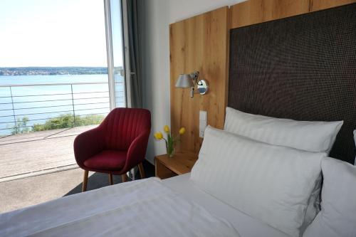 Кровать или кровати в номере Strandhotel Seehof