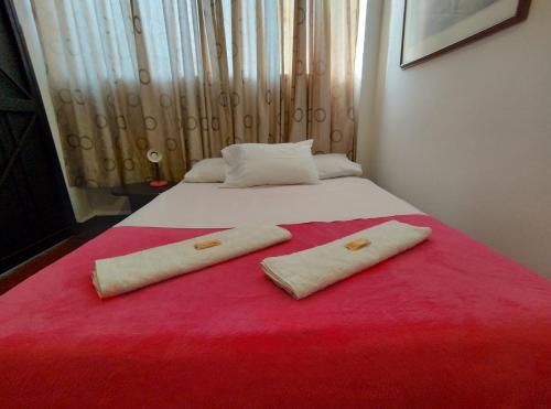 Cama o camas de una habitación en Hotel Ricocampo