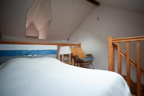 Ένα ή περισσότερα κρεβάτια σε δωμάτιο στο Studio Triplex de Charme Bord de Rance