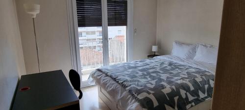 Postel nebo postele na pokoji v ubytování Chez Denis-Jo Chambres d'hôtes