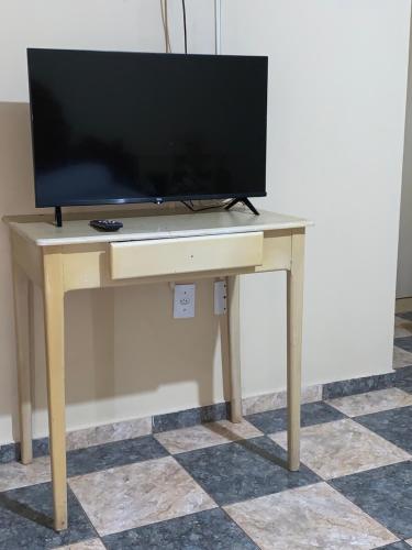 TV a/nebo společenská místnost v ubytování Hotel Potiguar