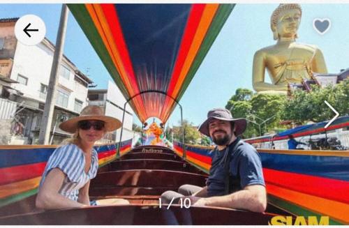 a man and a woman sitting in a hot air balloon at Bangkok Siam in Bangkok