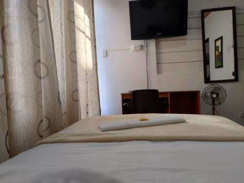 Cama o camas de una habitación en Hotel Ricocampo