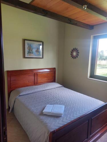 Posteľ alebo postele v izbe v ubytovaní Agriturismo Podere Bianca Maria