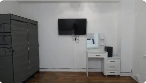 TV a/nebo společenská místnost v ubytování Kingdom Residence