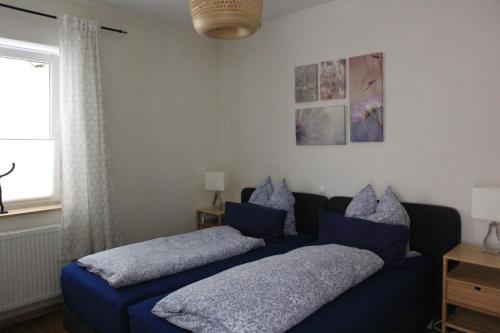 Katil atau katil-katil dalam bilik di Apartment Abtei Sayn