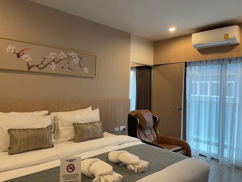 Katil atau katil-katil dalam bilik di Chinatown Living Hatyai