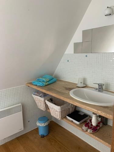 a bathroom with a sink and a mirror at La Sautie in Bars
