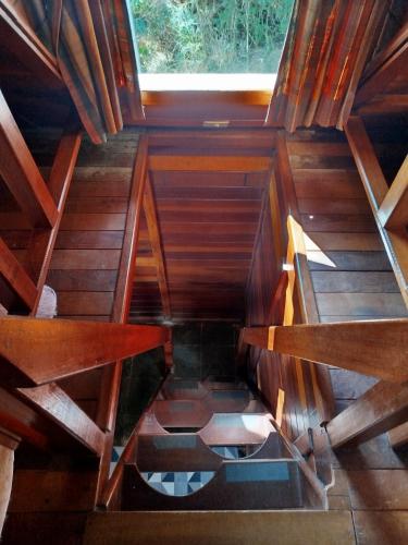 an overhead view of a room in a wooden house at Cabanas La Suisse in Campos do Jordão