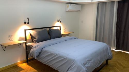 Postel nebo postele na pokoji v ubytování Pyramids Nights Hostel