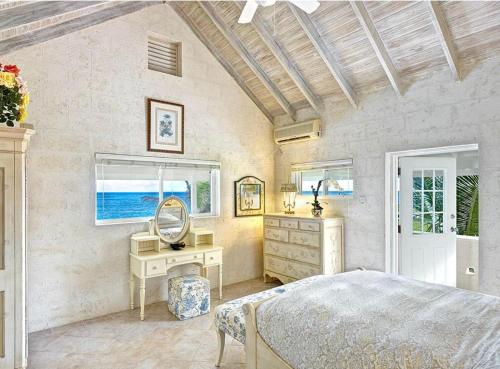 Ένα ή περισσότερα κρεβάτια σε δωμάτιο στο ZenBreak Ocean Mist Villa 5bd