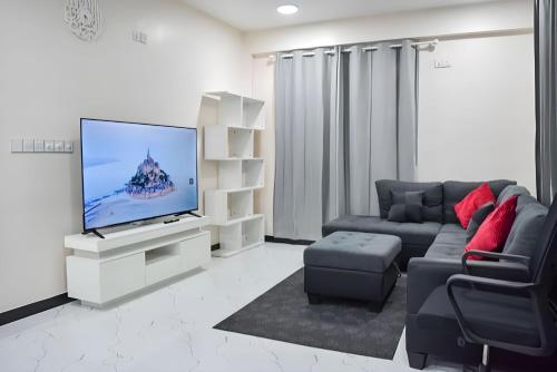 TV a/nebo společenská místnost v ubytování EQUATOR RETREAT