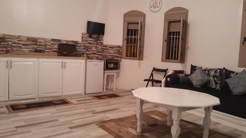 Una cocina o cocineta en Welcome Home