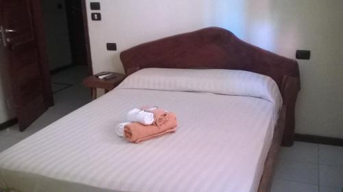 
A bed or beds in a room at Pousada Pura Vida
