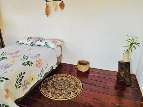 Ένα ή περισσότερα κρεβάτια σε δωμάτιο στο Cabaña - Barlovento Ecolodge Tarapoto